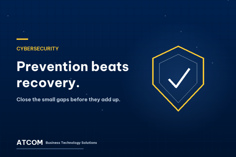 ATCOM cybersecurity graphic: a shield with a checkmark beside the words "Prevention beats recovery."